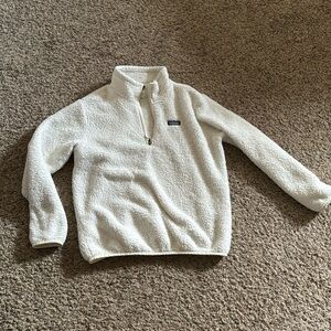 Worn only a couple times, warm and fuzzy half zip up sweater